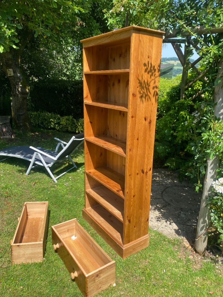 Pine bookcase with two drawers