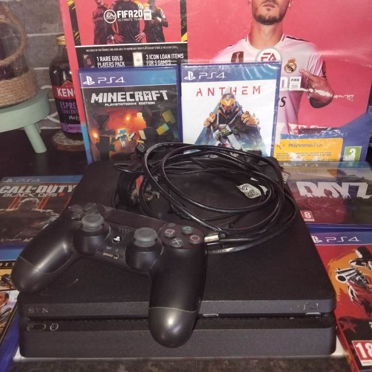 Sony PS4 Console with Controller and Games – Good Condition
