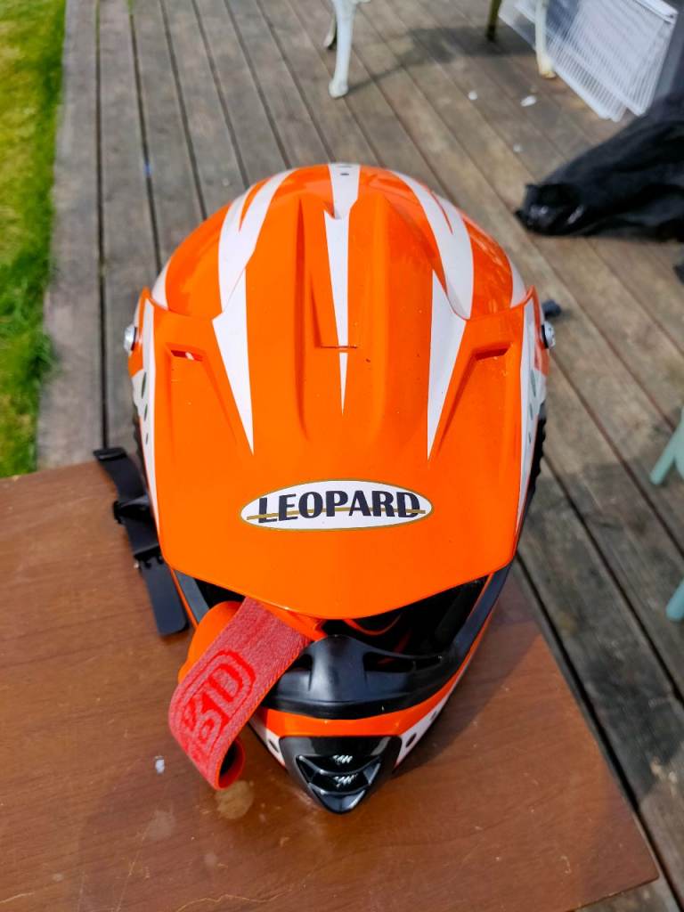 Two leopard motorcycle helmets for sale 