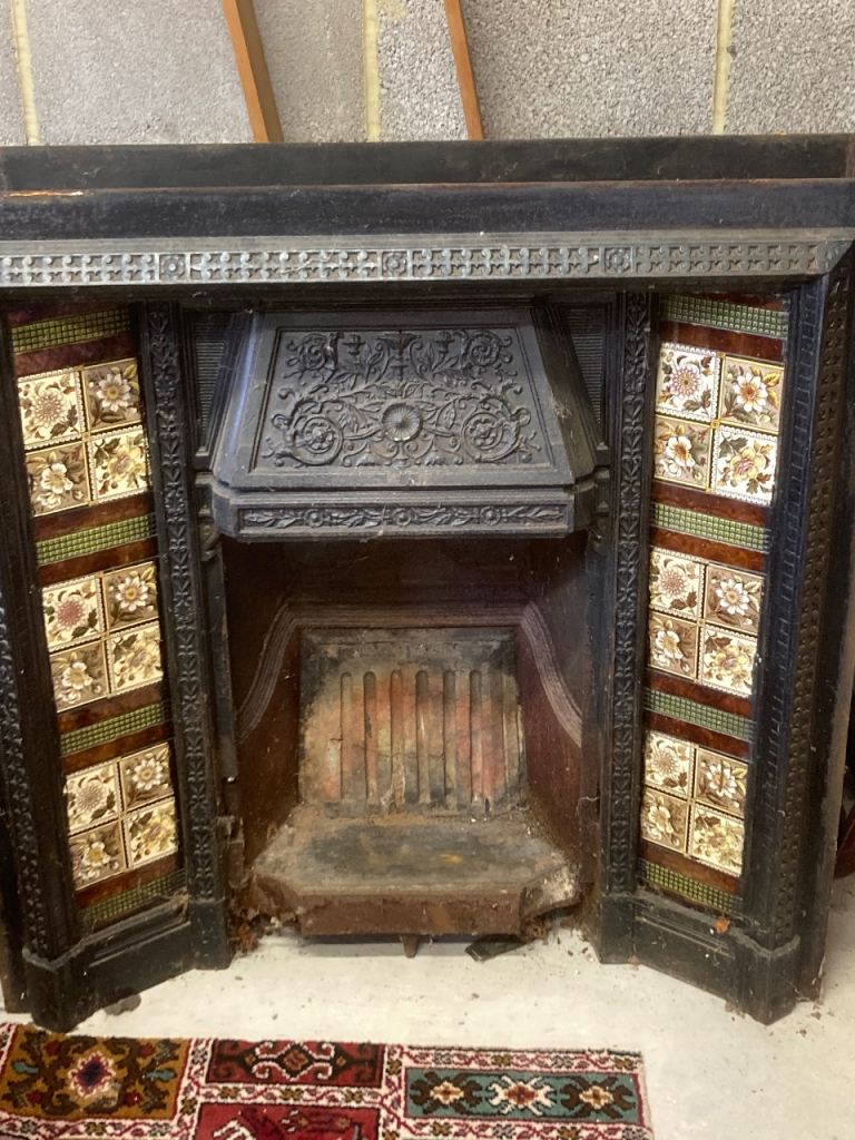 Antique Cast Iron Fireplace with Decorative Tiles