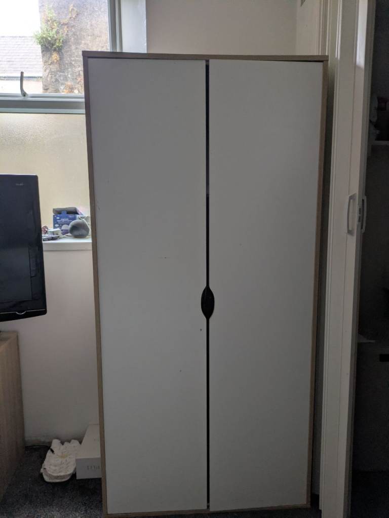 White Two-Door Wardrobe with Light Wood Trim – Good Condition