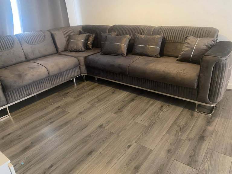 Modern L-Shaped Corner Sofa with Gold Trim & Cushions