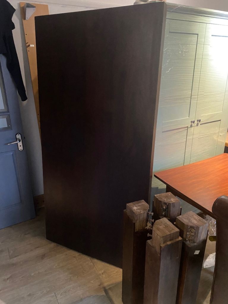 A MODERN SIX SEATER SOLID HARDWOOD DINING TABLE ,OVERALL CONDITION IS GOOD ,DELIVERY