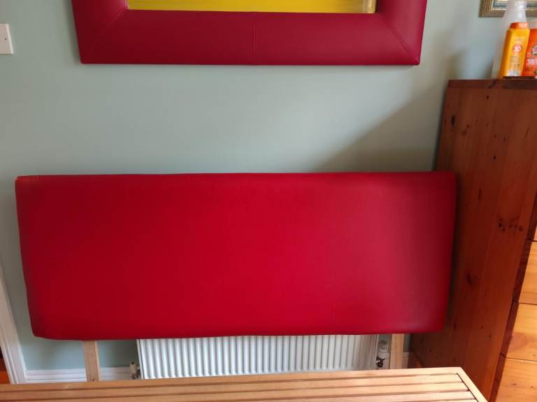 Red upholstered faux leather double headboard with Fire Label