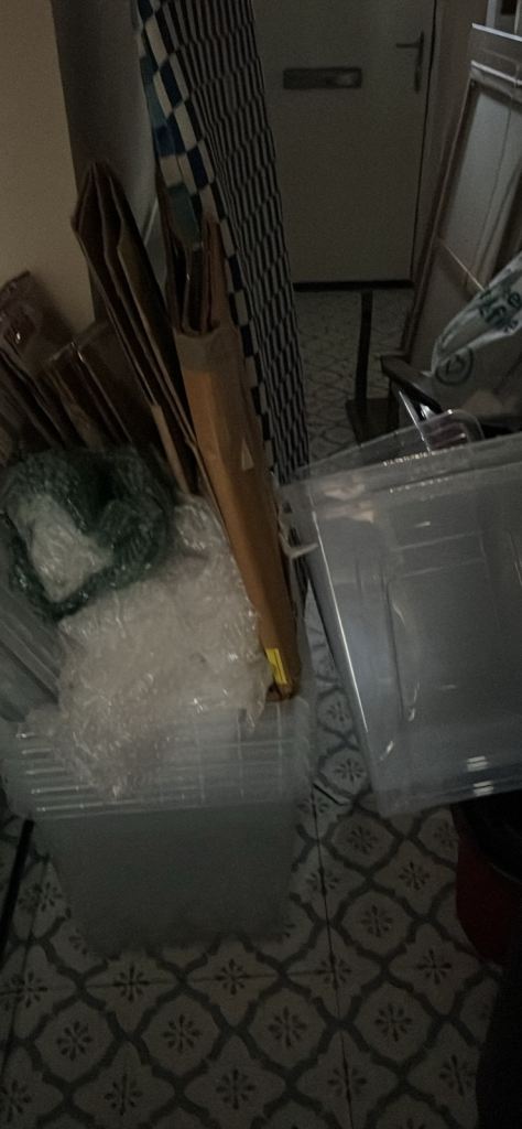 Seven plastic boxes, cardboard boxes