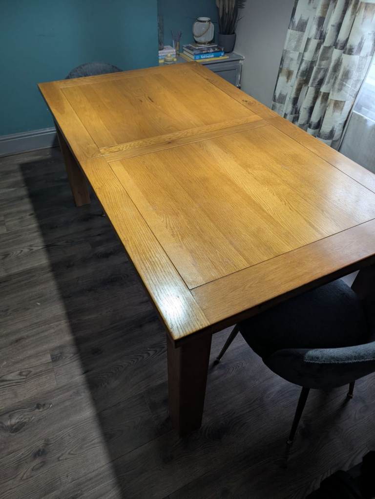Solid wood extendable dining table - used with a few marks , £40.00 for ...