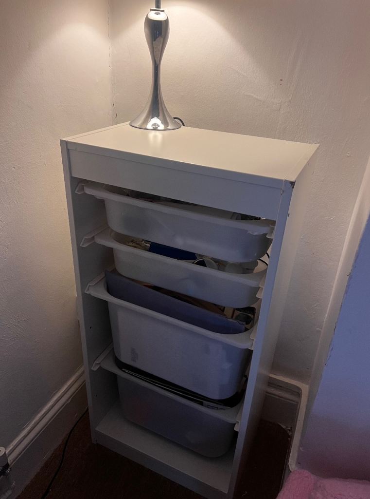 White multi-storey shelving unit