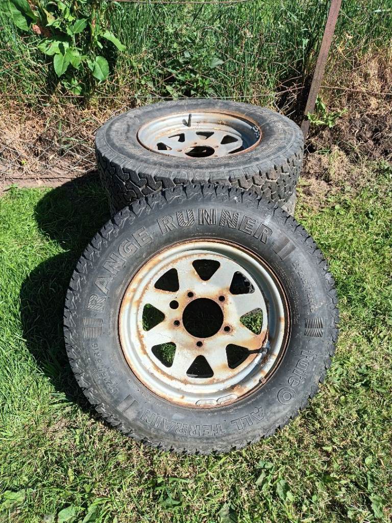 4 x Used Silver Steel Suzuki 15 Inch Wheels & Tyres