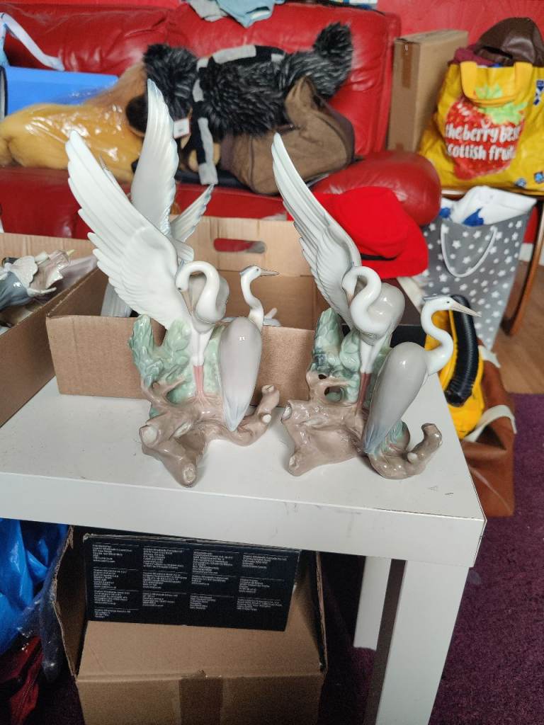 Pair of Elegant Ceramic Resting Herons 1