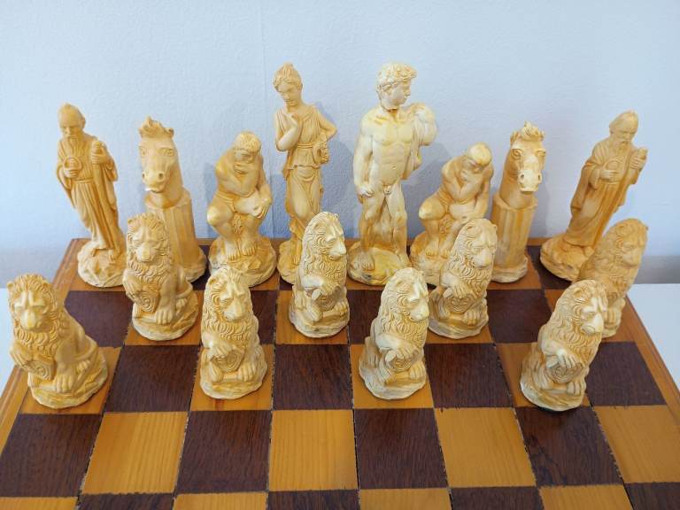 Unique Chess Set with Detailed Pieces and Wooden Board