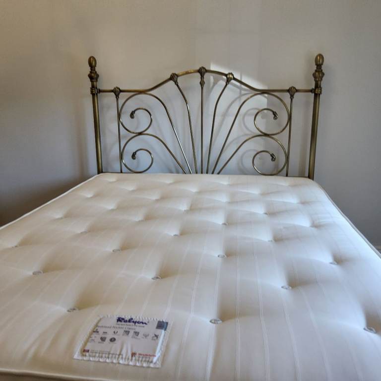 Antique gold effect metal headboard