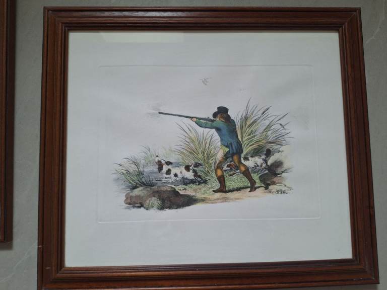 Pair of vintage framed duck shooting prints