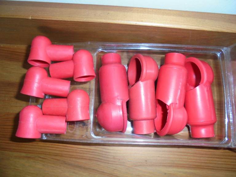 Battery terminal boots, insulating caps. 4 large, 5 small. Marine or motor vehicle.