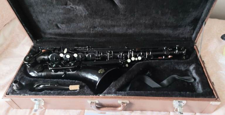 Tenor saxophone. As new, black lacquer.