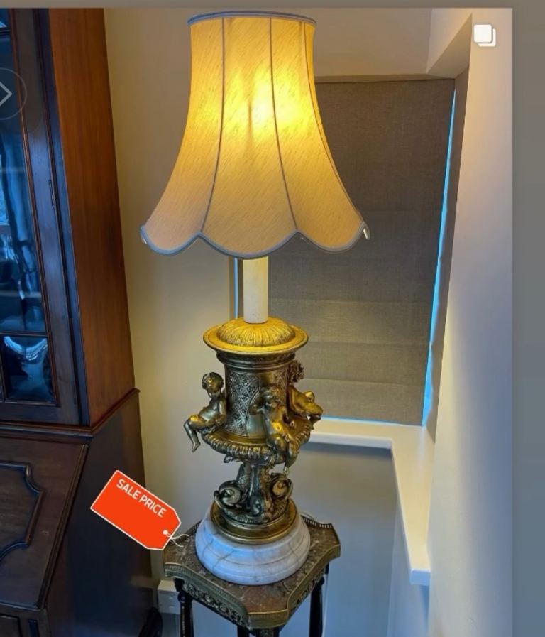 Antique table lamp on a marble base