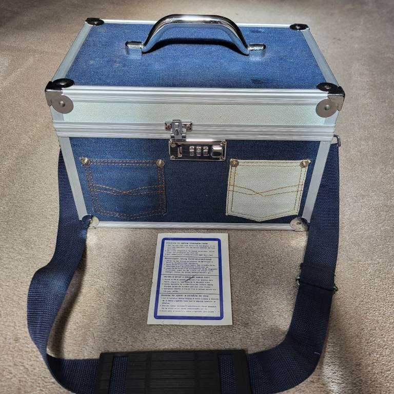 VANITY/MEDICATION COMBINATION LOCK CASE WITH DENIM LOOK DESIGN WITH INTERNAL MIRROR.