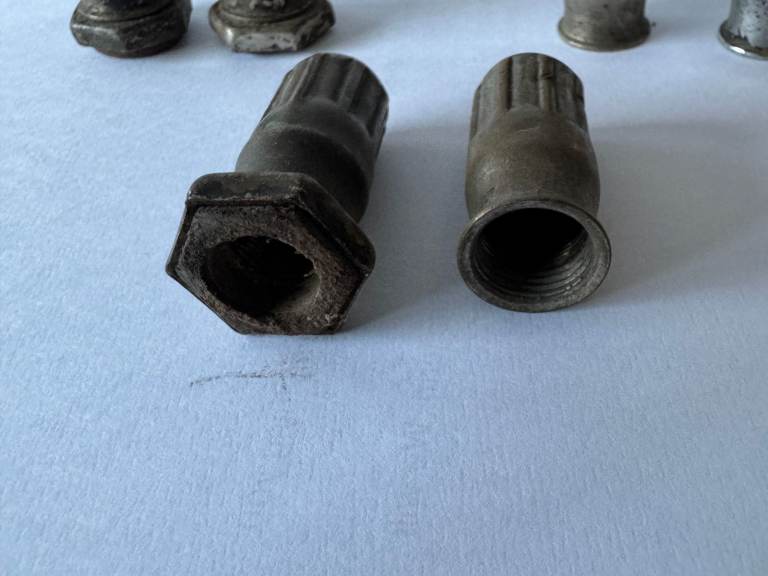 old pre war car tyre  valve caps