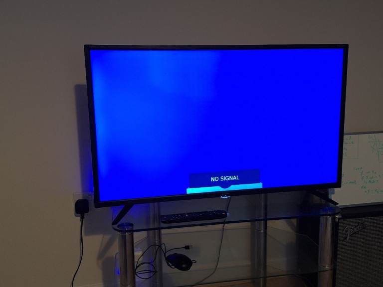 TV and glass TV stand