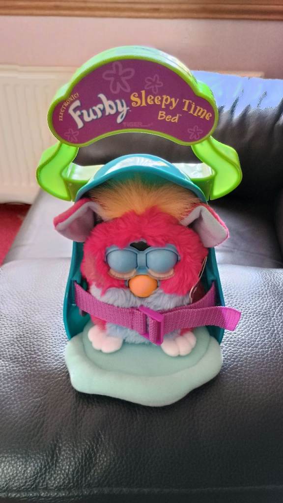 Furby and  Sleep Time Bed. 