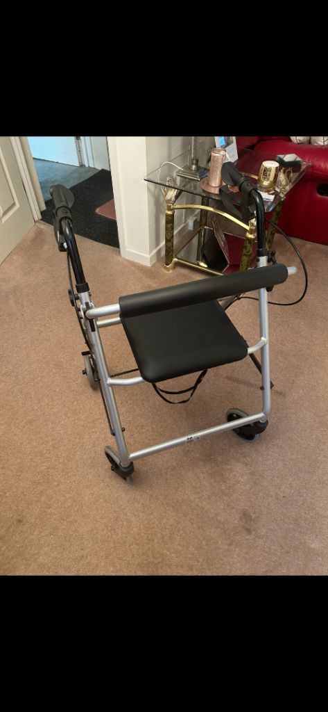 Invacare Rollator Walker with Seat and Brakes – Good Condition