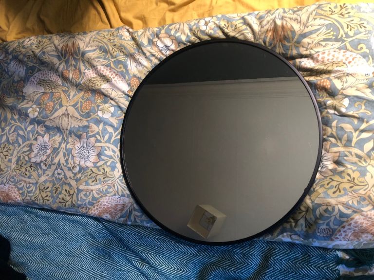 Black circular mirror 