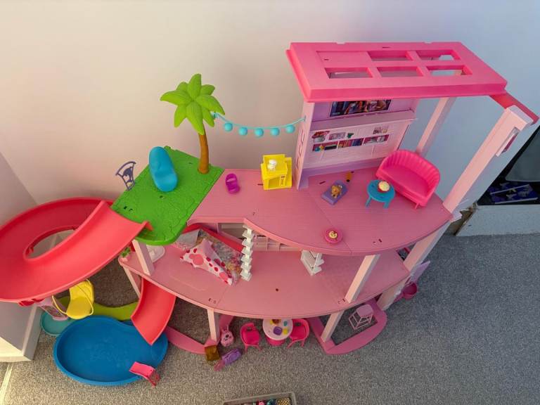 Barbie dream house, 30dolls, cars and caravans