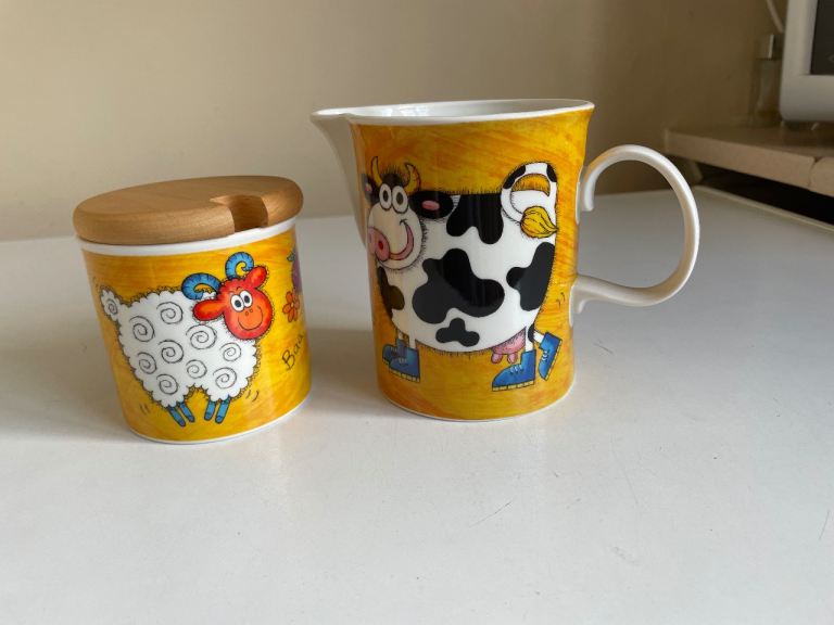 Milk jug and sugar bowl