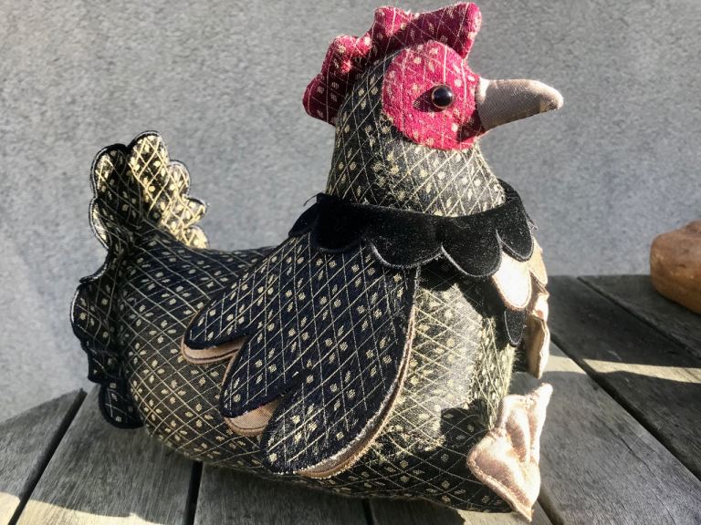 Colourful fabric hen.