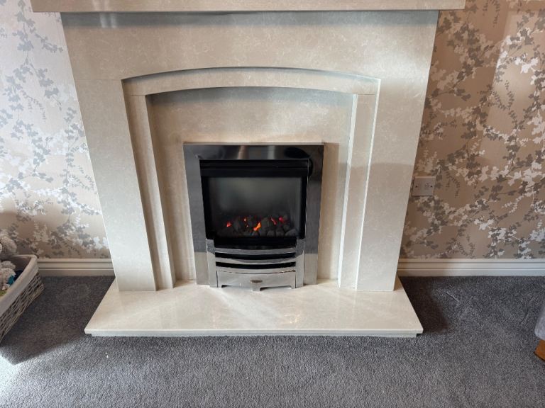 Living flame gas fire with marble fireplace