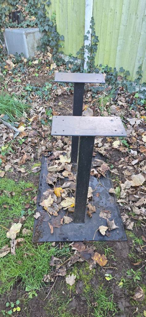 image for Heavy-duty metal support legs on a base plate.  