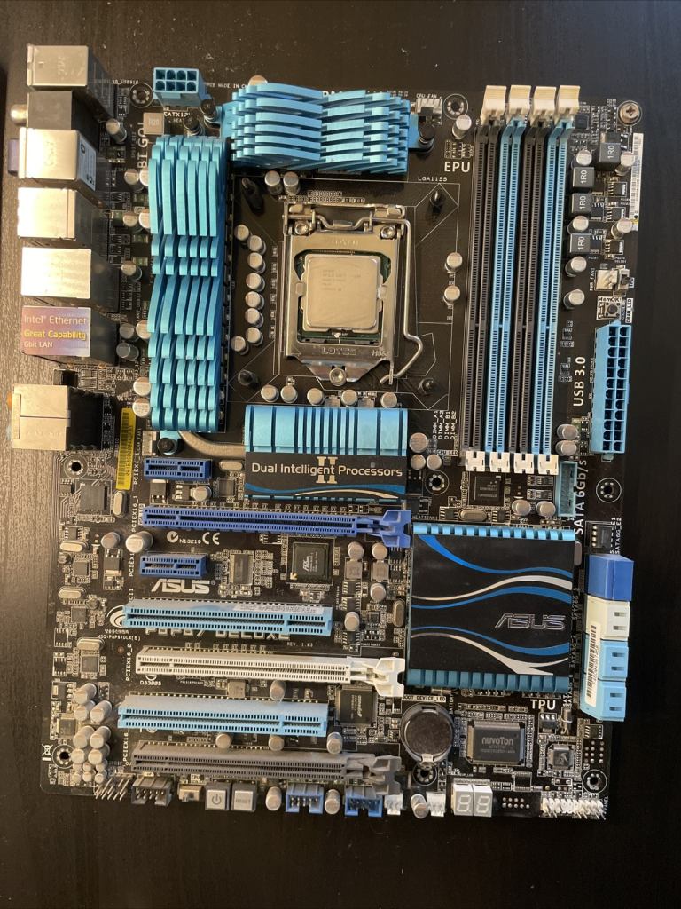 Intel Core i7 2600K with Motherboard and Liquid CPU Cooler