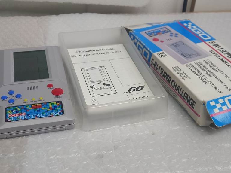 X-GO 5-in-1 Super Challenge Handheld Console with Box
