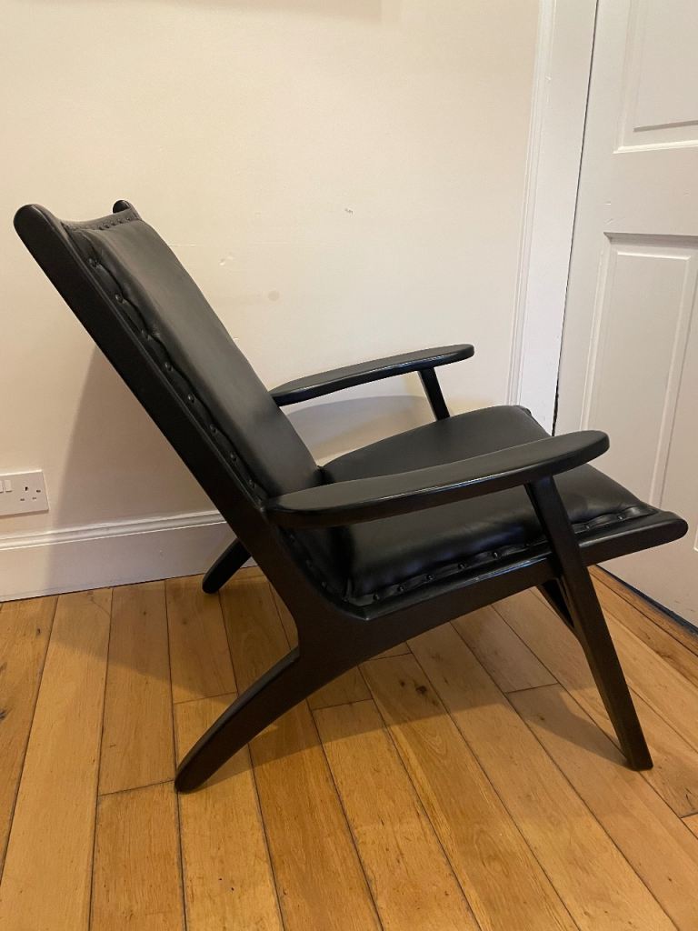 Black Leather and Teak Designer Armchair – Stylish & Comfortable