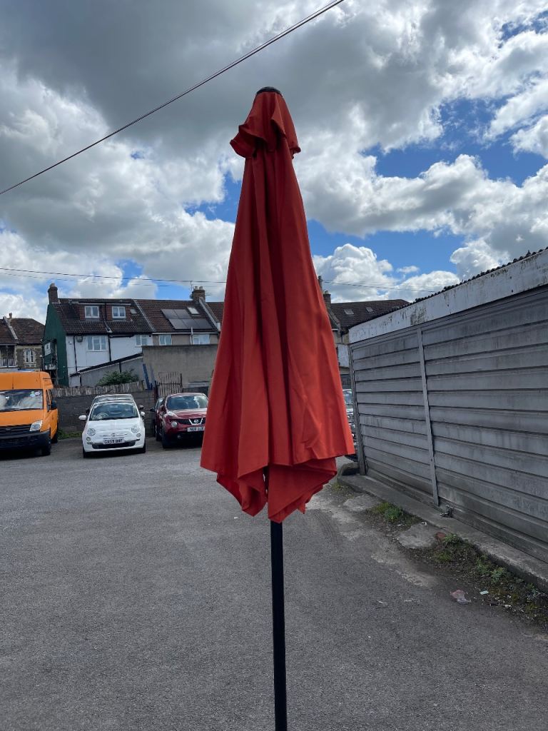 New burnt orange garden parasol 