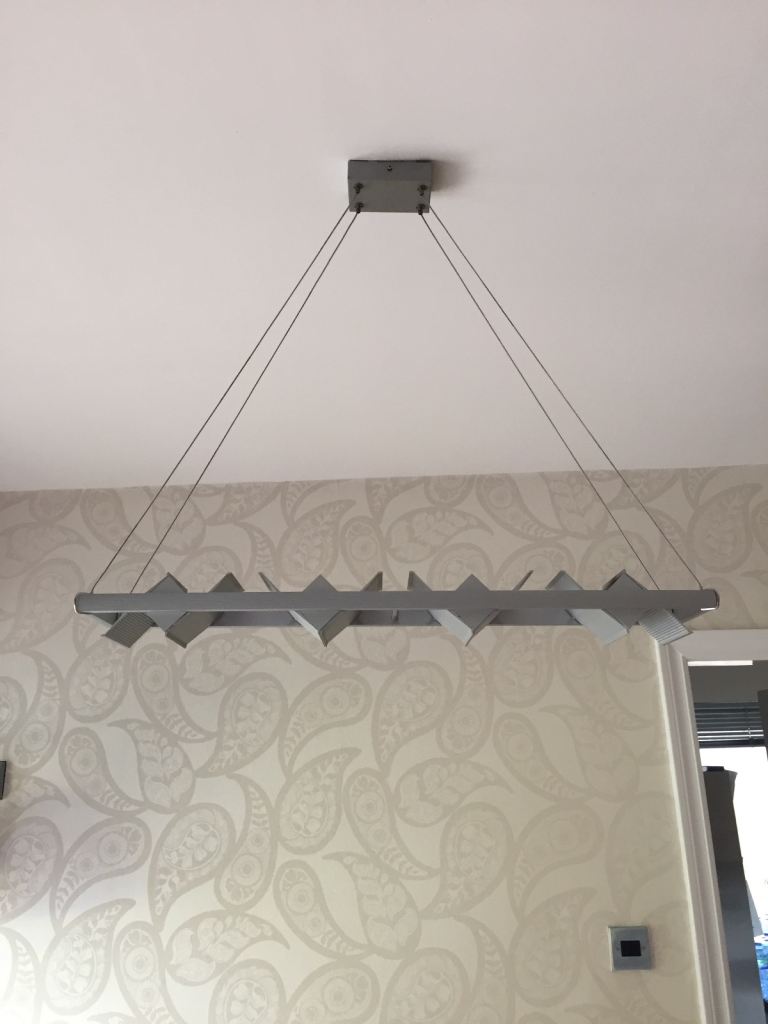 Matching matt silver ceiling pendant and wall lights