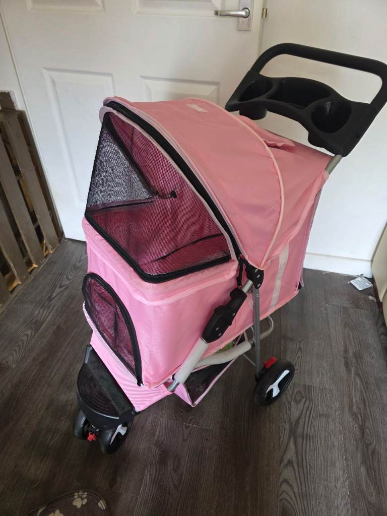 Pink pet stroller