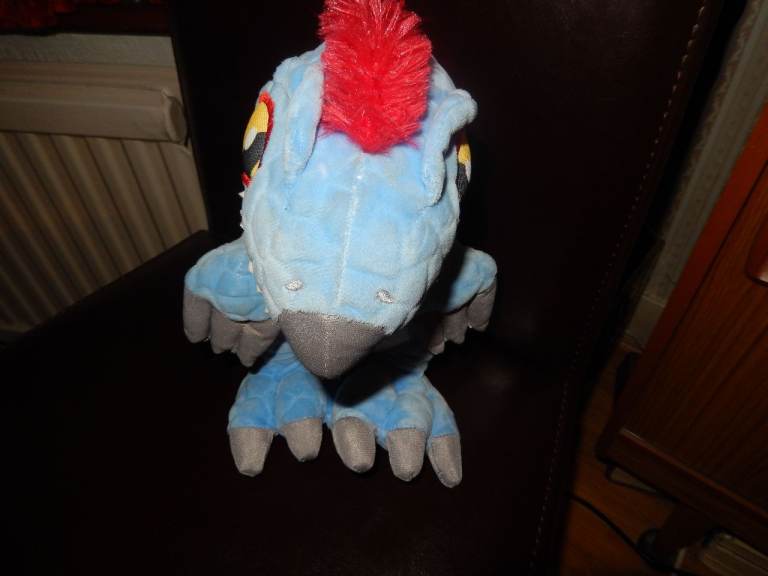 Blue and Red Bird Plush Toy – Good Condition JURASSIC WORLD
