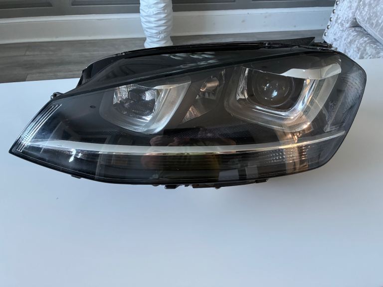 Vw Golf L/H xenon headlamp.