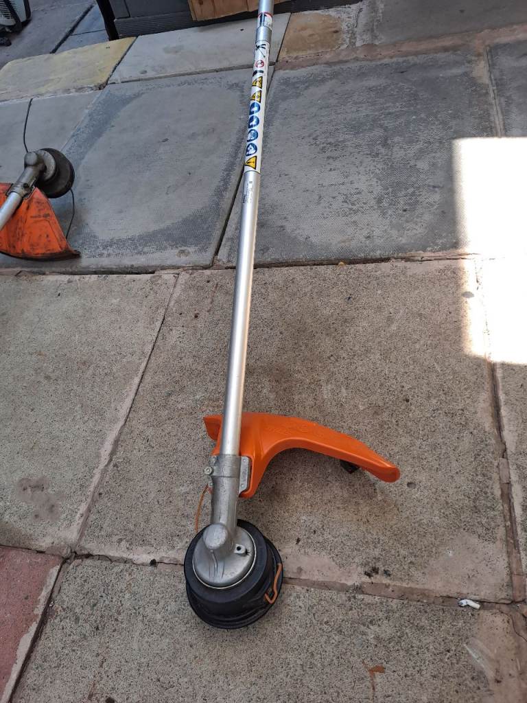 Stihl km  strimmer attachment 