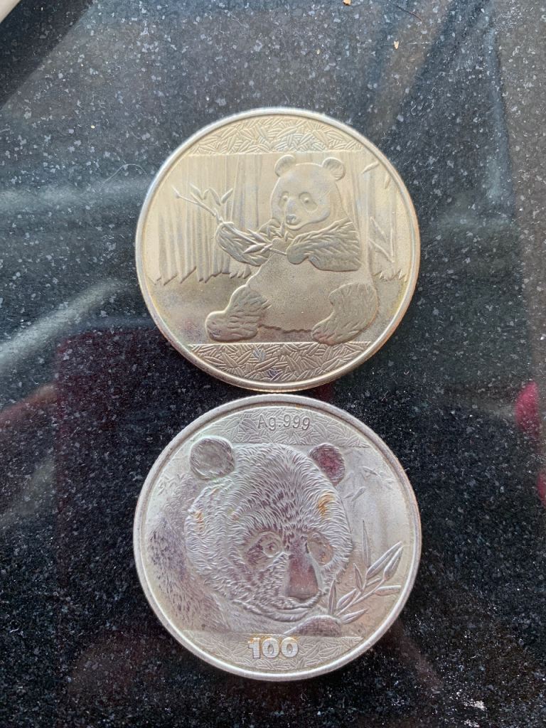 Chinese fine silver and gold panda coins