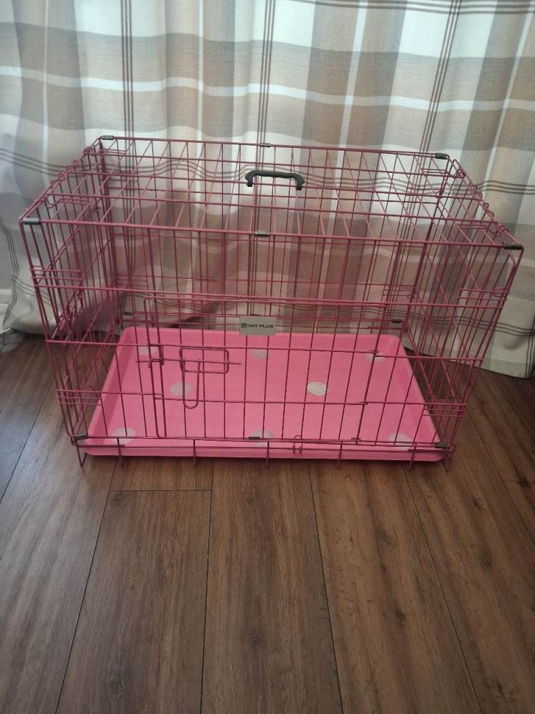 Pink dog crate 