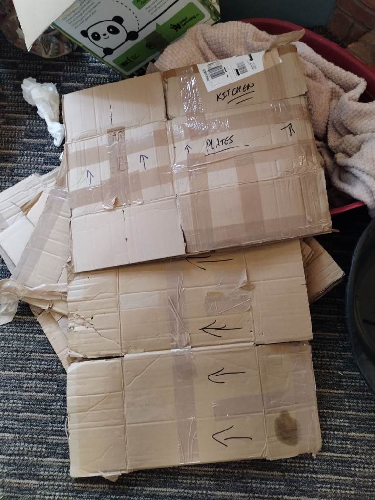 Pile of Cardboard Boxes - Used for Moving