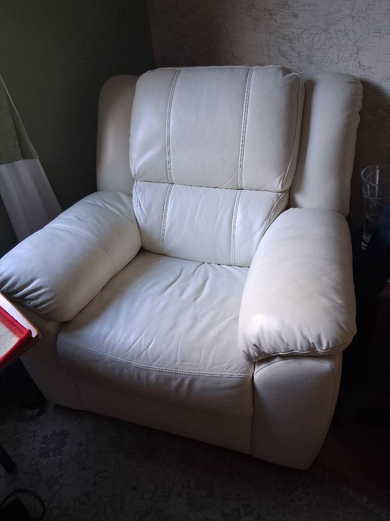 Large, pale cream lounge chairs 