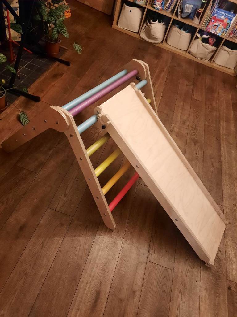 Sawdust and Rainbows Wee'Un pikler climbing triangle with slide and climbing discs