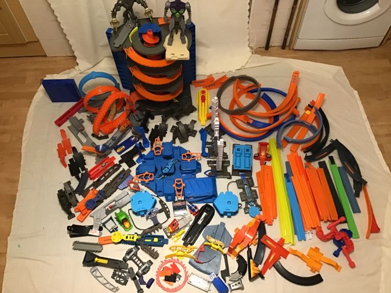 Massive job lot Hot wheels track,garage,motorised boxes,twists,dinos and more