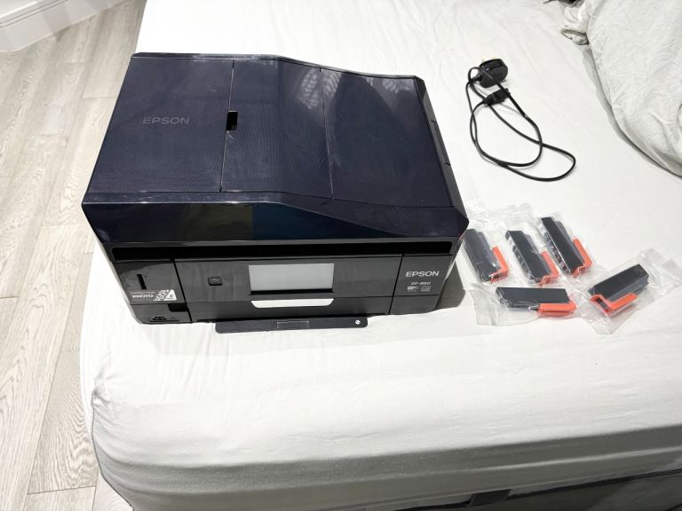 EPSON XP-860 PRINTER WITH SOME EXTRA BLACK INK CARTRIDGES, FULL WORKING ORDER, CAN DELIVER