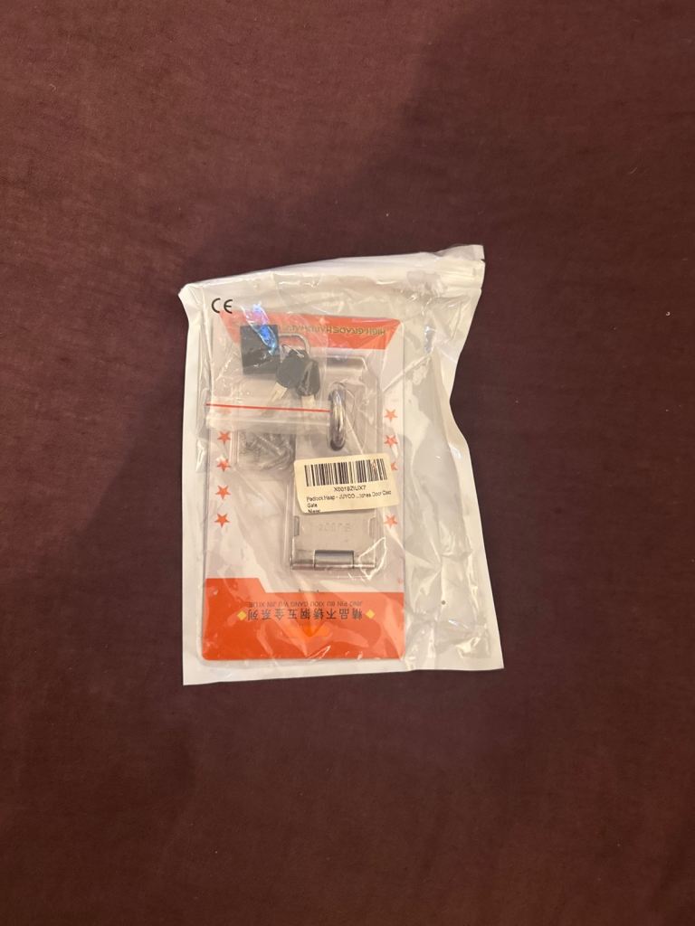 Lock with keys (closed package) and Padlock