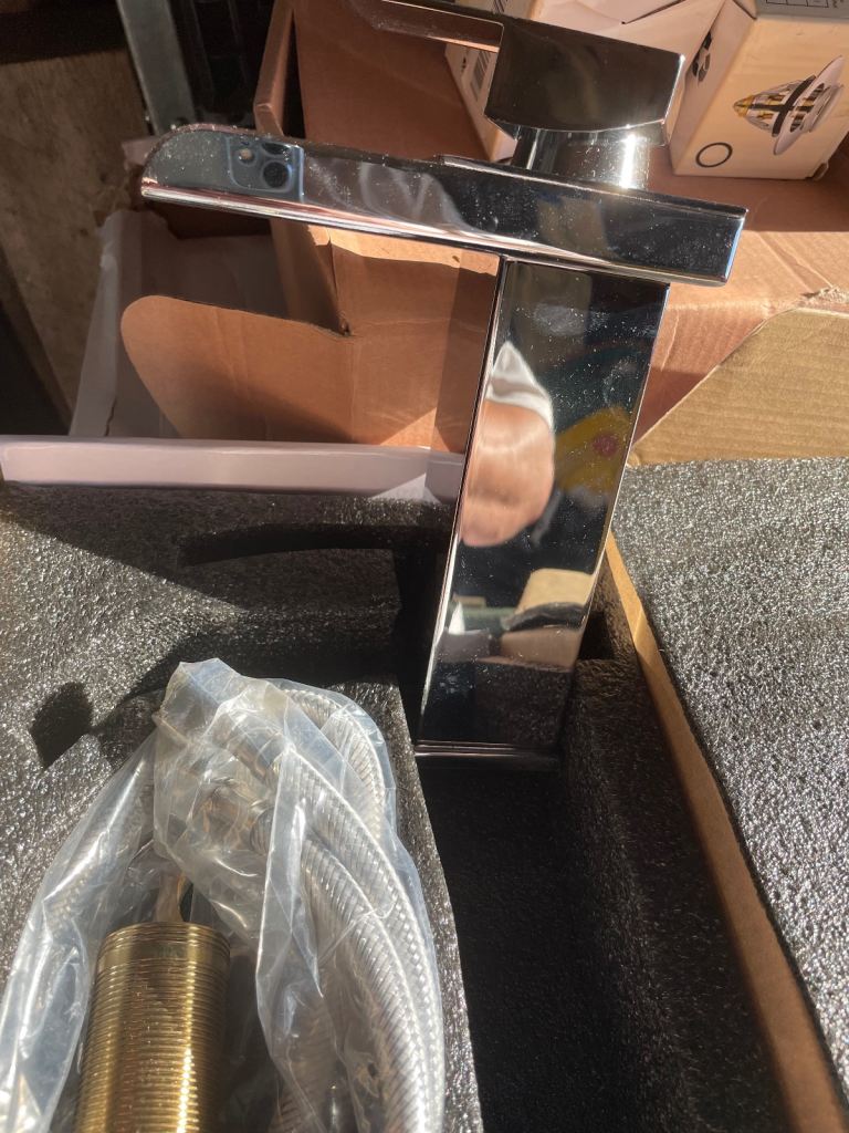 Water fall style basin mixer tap