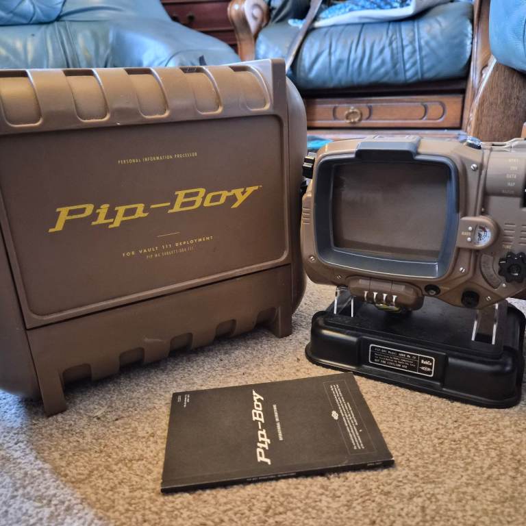 Fallout 4 Pip-Boy Replica with Stand and Manual