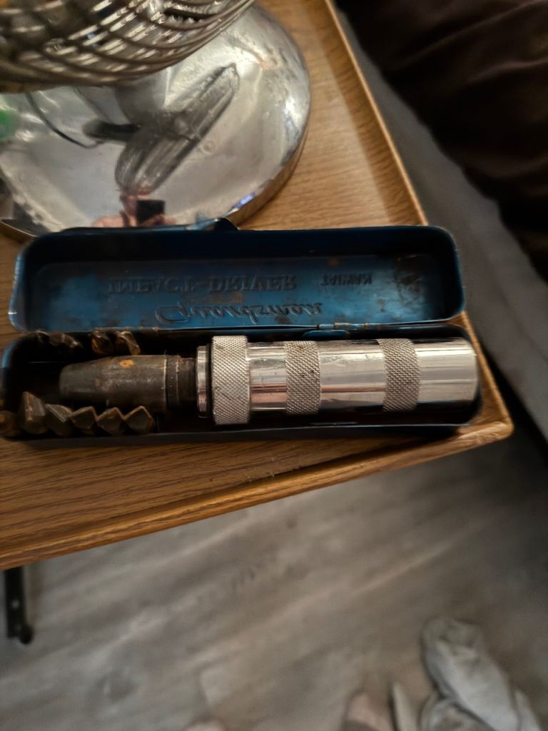Grandman Impact Driver with Bits in Metal Case – Fair Condition